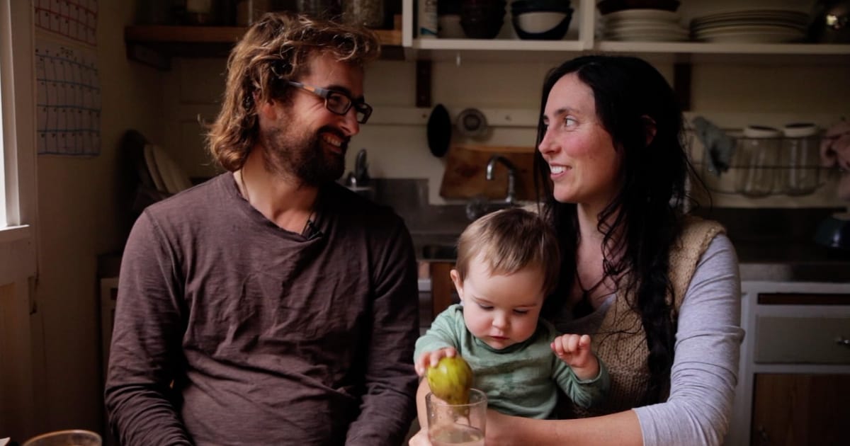 Still of a New Zealand couple with their baby in "Living the Change" documentary